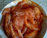 A picture of step 2 of My Marinated Chicken Strips in a wrap Red Hot Sauce.