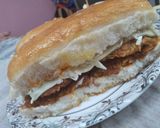 A picture of step 8 of Chicken Supreme Burger.