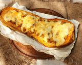 Foto del paso 6 de la receta: 💫 Calabaza rellena de arroz y bolognesa gratinadas 💫