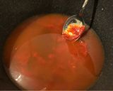 A picture of step 1 of Toppogi (Spicy Korean mochi soup).