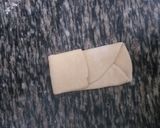 A picture of step 4 of Atta Square Chapo# ThemeChallenge #Coconut Chapati Contest.