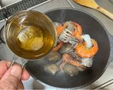 A picture of step 2 of Seafood Pan Rice.