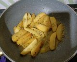 A picture of step 12 of Aloo Posto.