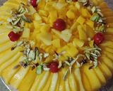 A picture of step 6 of Mango tres leches Cake.