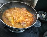 A picture of step 5 of Spicy Garlic Chicken Curry.