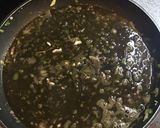 Foto del paso 5 de la receta: Arroz negro con calamares