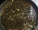 Foto del paso 5 de la receta: Arroz negro con calamares