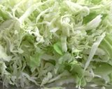 A picture of step 8 of Orange rice, Chicken Stew and Creamy Cabbage Salad.