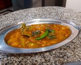 A picture of step 5 of Pumpkin curry.