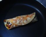 A picture of step 12 of Manchurian frankie roll.