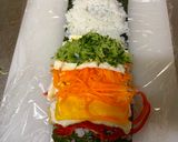 A picture of step 4 of Rainbow Roll Sushi.