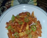 A picture of step 11 of Garlic ketchup fries.