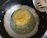 A picture of step 2 of Khaati Meethi Aam Ki Poori.