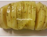 Hình bước làm 3 của món Khoai tây bỏ lò nướng bơ tỏi phô mai