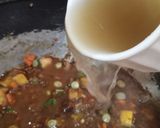 Foto del paso 5 de la receta: Arroz meloso de cerdo con vino tinto