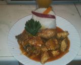 A picture of step 6 of Fried chicken served with rice.