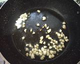 A picture of step 2 of Potato Capsicum fry.