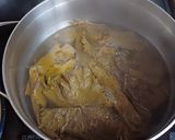 A picture of step 1 of Dolmadakia Yalantzi (Stuffed Grape Leaves).