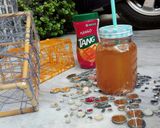 A picture of step 1 of Orange Tang Cocktail.