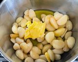 A picture of step 1 of Whipped Garlic Confit Spread:.