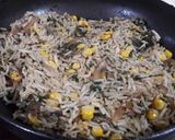 A picture of step 2 of Garlic Spinach Corn Rice.