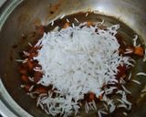 A picture of step 4 of Carrot Tomato Rice.