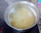 Foto del paso 2 de la receta Plumas a la boloñesa con 5 quesos al horno