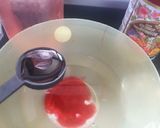 A picture of step 2 of Rooh afza drink with chia seeds.