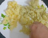 A picture of step 1 of Sweet potato Halwa.