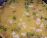 A picture of step 3 of Scamorza, pancetta and asparagus frittata, with crispy potatoes.