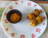 A picture of step 3 of Mini masala paniyarum.