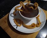 A picture of step 5 of Colacao Hot Chocolate with Mini Churros.