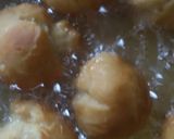 Foto del paso 4 de la receta Buñuelos de sabor fresa y chocolate