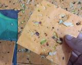A picture of step 11 of Orange Flavored Ice halwa.