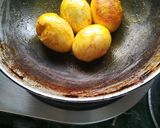 A picture of step 1 of Egg Dum Biryani.