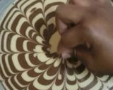 A picture of step 9 of Zebra cake#author marathon.