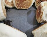 Foto del paso 4 de la receta: Pancito relleno de manjar al sartén