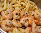 Foto del paso 11 de la receta Plumas con langostinos, almejas y verduritas