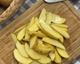 Foto del paso 1 de la receta: Patatas gajo especiadas al horno