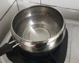 Foto langkah ke 2 dari resep Bubur jagung topping keju.