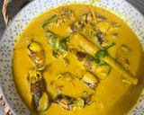 Gambar langkah 9 resipi Sotong Sumbat Masak Lemak Kuning.