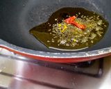 A picture of step 2 of Ivy Gourd Masala Fry.
