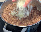 Foto del paso 7 de la receta: Arroz meloso con jamón ibérico, Idiazábal y alcachofa
