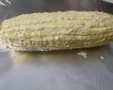 A picture of step 3 of Mayo Parmesan Corn On the Cob.