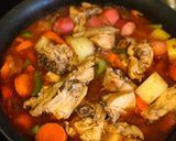 A picture of step 9 of Chicken Afritada.