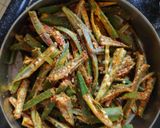 A picture of step 1 of Crispy bhindi.