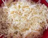 A picture of step 3 of Anti Vampire Cheese Sauce, with Onions and Garlic.