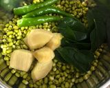 A picture of step 2 of Stuffed Whole Moong Dal Dosa.