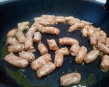 Foto del paso 3 de la receta: Arroz caldoso con costilla de cerdo y salchichas