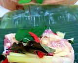 A picture of step 3 of GARANG ASEM (Chicken Steamed in Banana Leaves).